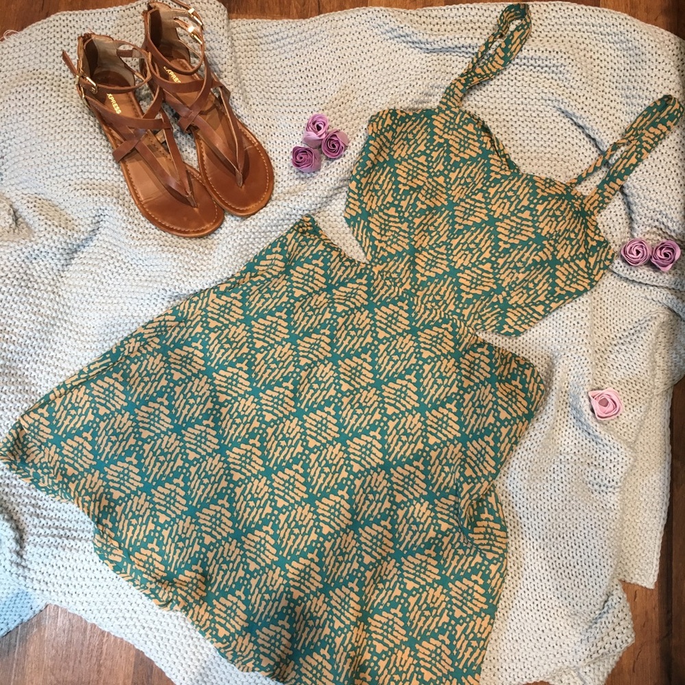 Super cute cut out dress.